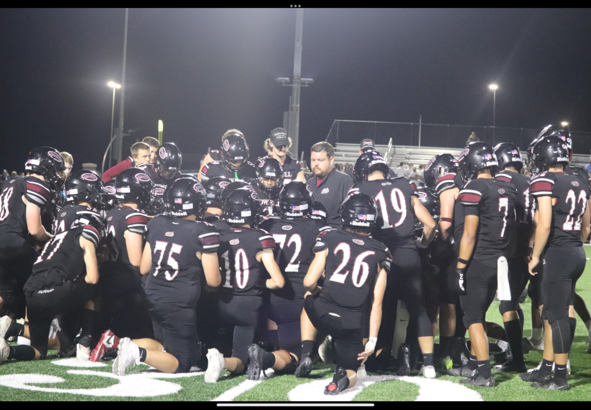 Get better everyday. Casey McKim talks to his team after the crown point game. This was the first game the team has played.