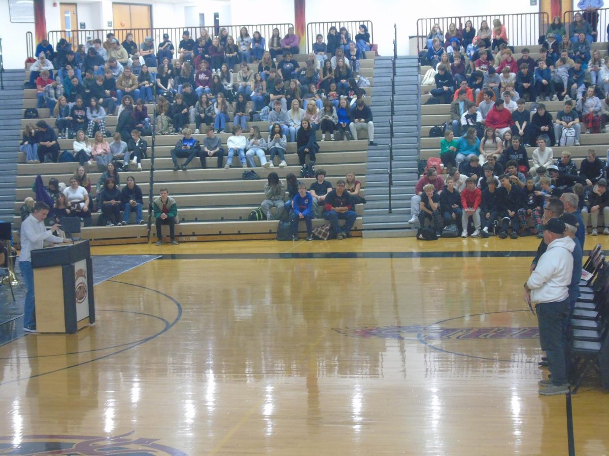 Jack Brugos delivers a speech to the Lowell High School staff and students in honor of our veterans.