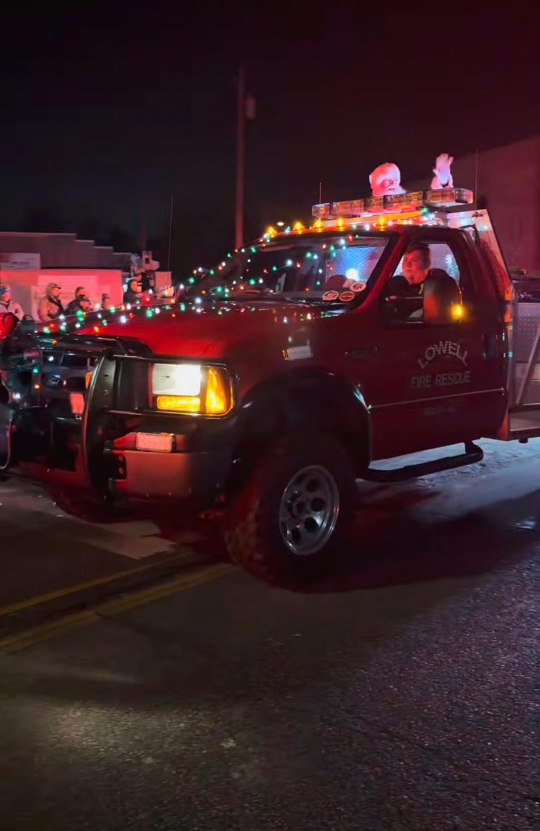Santa Waving To The Community