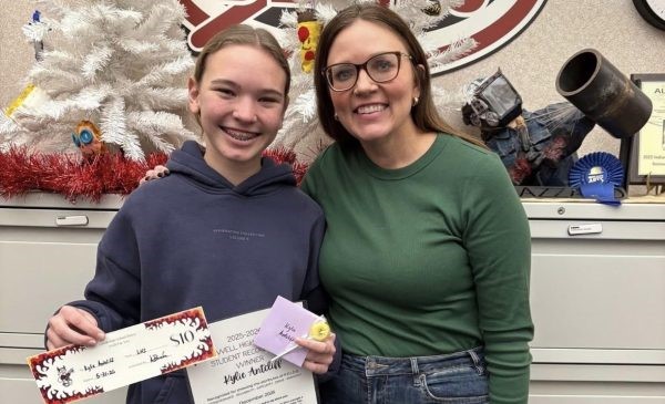 Freshman Kylie Antcliff received December’s "Student of the Month" award from Mrs. Camery. 