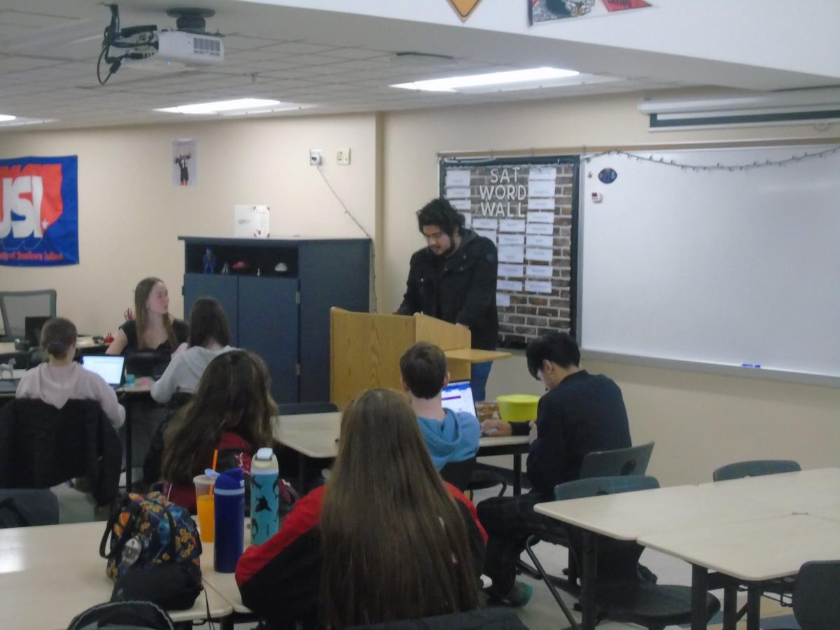 Senior Toribio Arriaga presents his "Object Speech." For this assignment, students delivered speeches using an object that holds significant value to them. The goal was for students to use presentational aids meaningfully without relying on them.