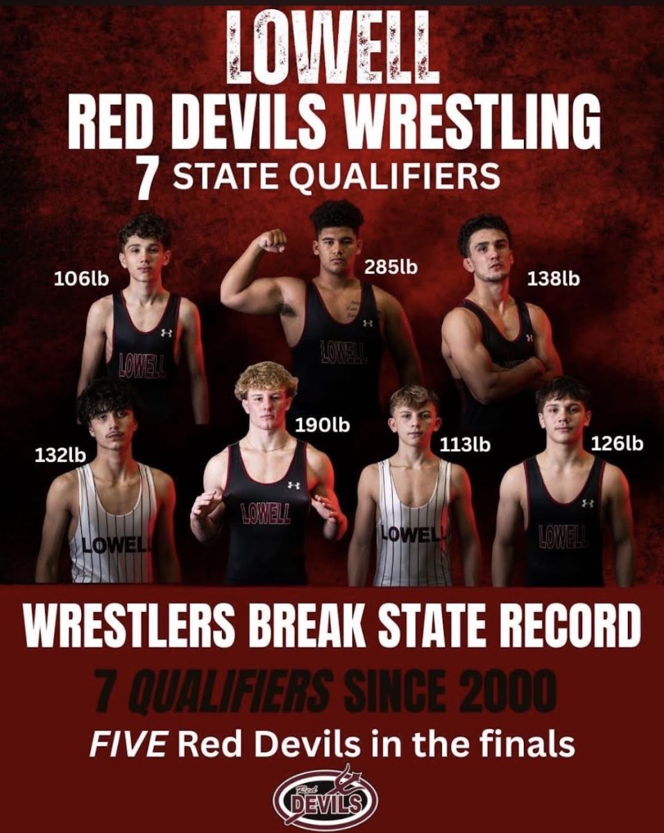 The seven state-qualifying wrestlers.