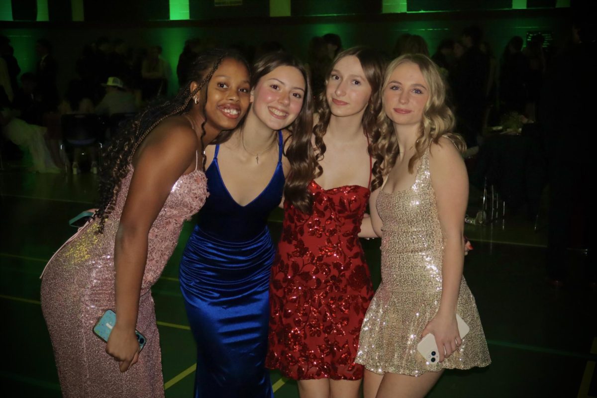 Ally Fremouw, Mikayla Rogers, Madelyn Emerson, and Emma Hamilton all posing for a picture. 
