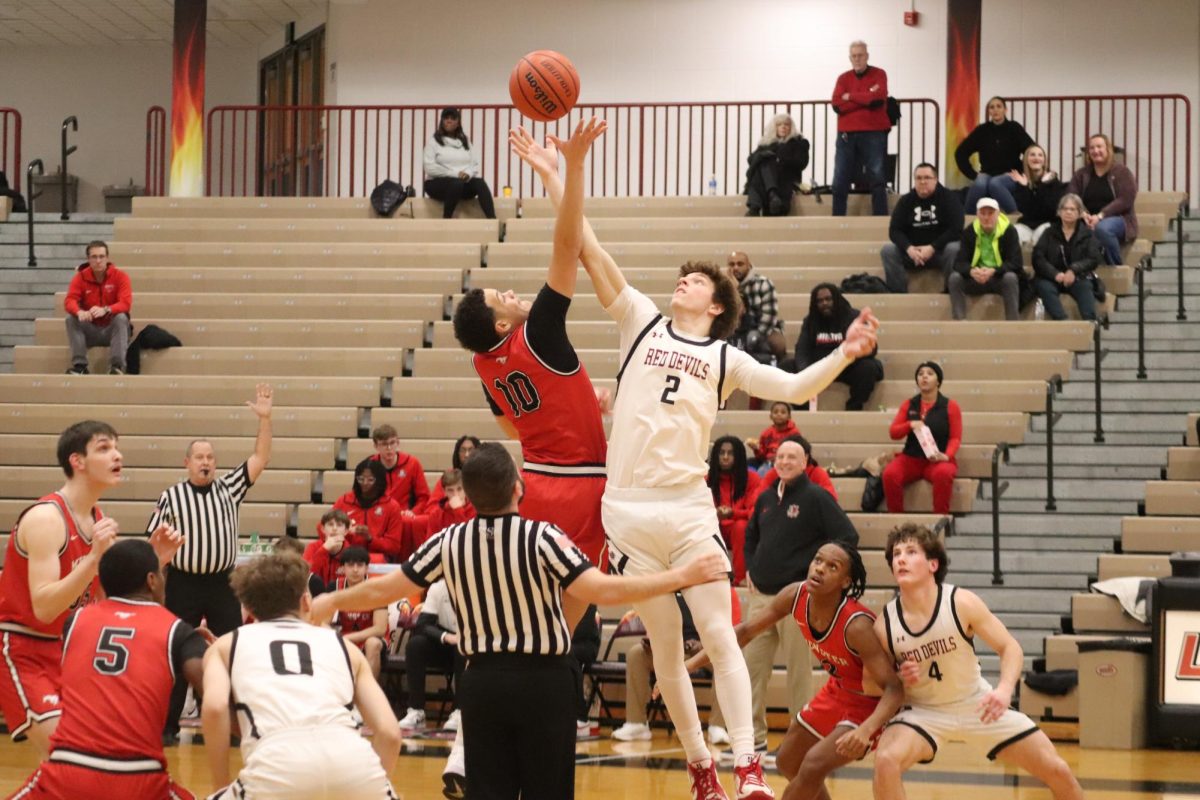 Senior Roan Vasko rises up for the jump ball against Munster. 