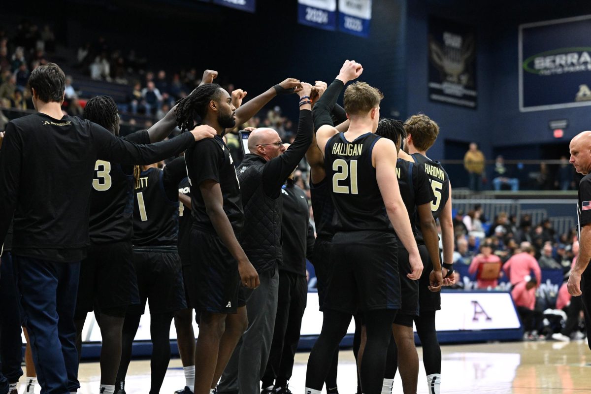 Akron prepares to go back on the floor after a timeout. 2nd half plays made Akron great all throughout the season
