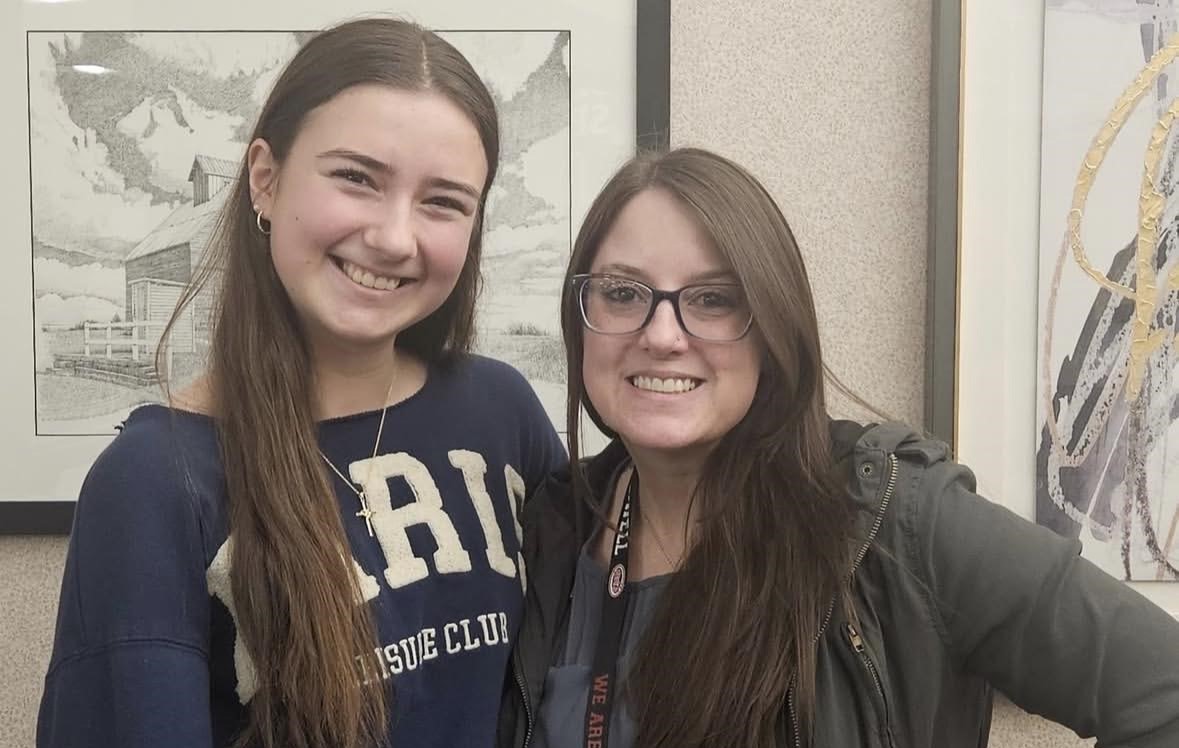 February Student of the Month, Hannah Mishlove, poses for a picture with Ms. McAllister, who nominated her.