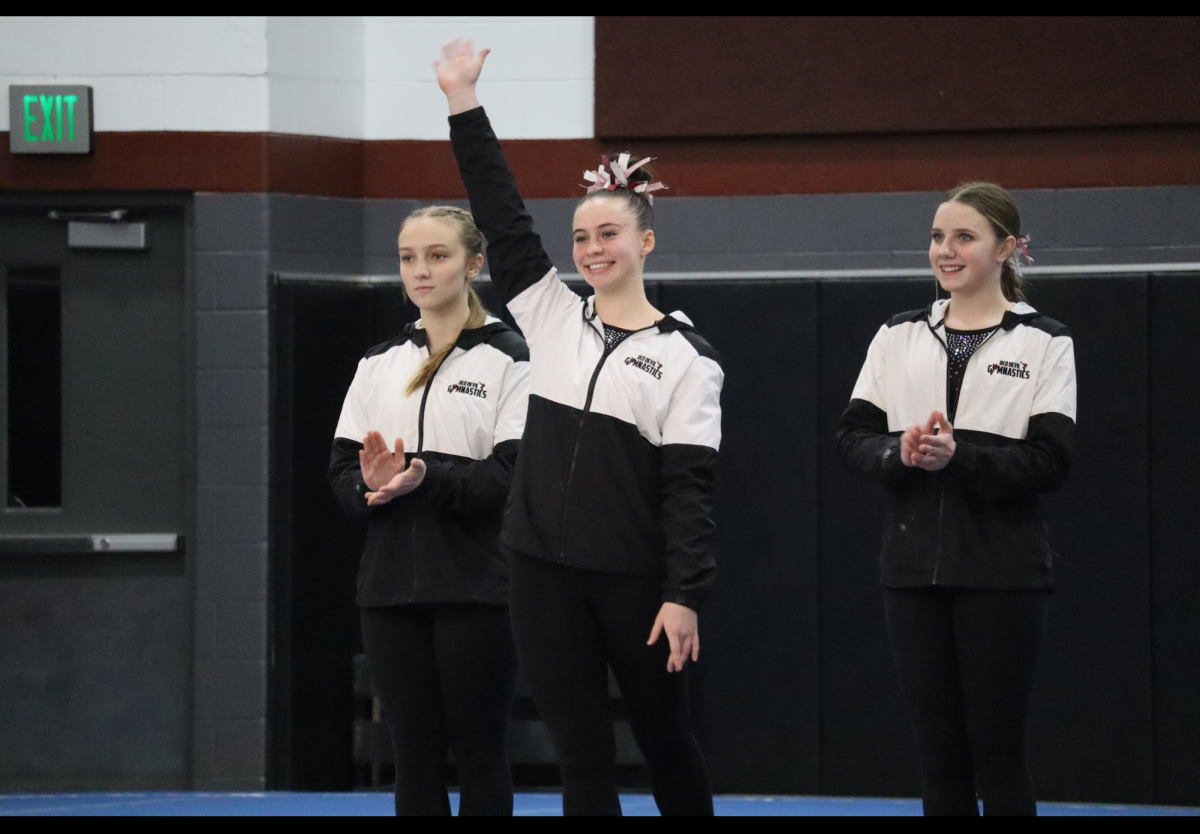Kendyl gets introduced at a home meet against Lake Central. She was excited and determined to win. 