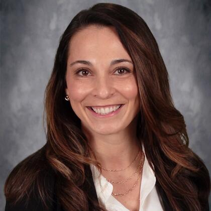 Katie Kimbrell steps into the role of athletic director, leaving her position as school board president to lead Lowell athletics.