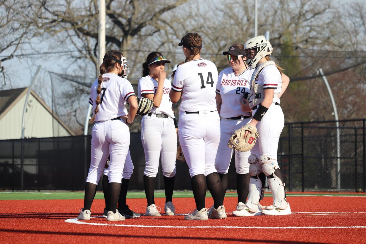 Lowell Girls Softball infield talks about their plans to get the next out! 
