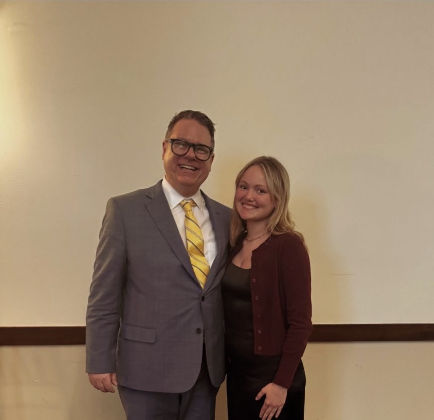 Summa Cum Laude graduate DezMarie Mago poses for a picture with her most influential teacher, Mr. Joseph Gianotti, an LHS English/Language Arts teacher. Mr. Gianotti has also organized the P.R.I.D.E. Banquet many times.