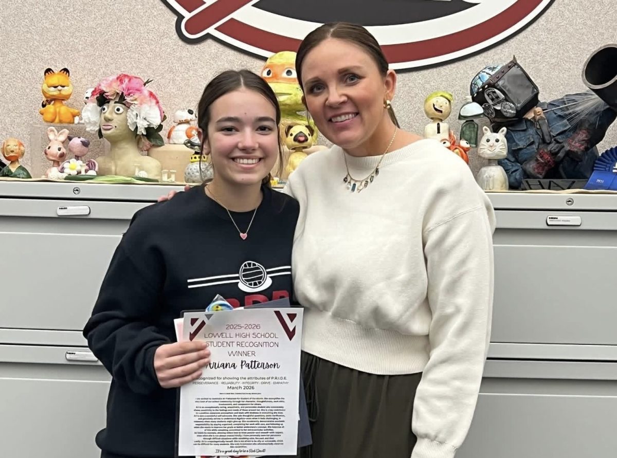 Ari poses with her Student of the Month nominator, Mrs. Camery.