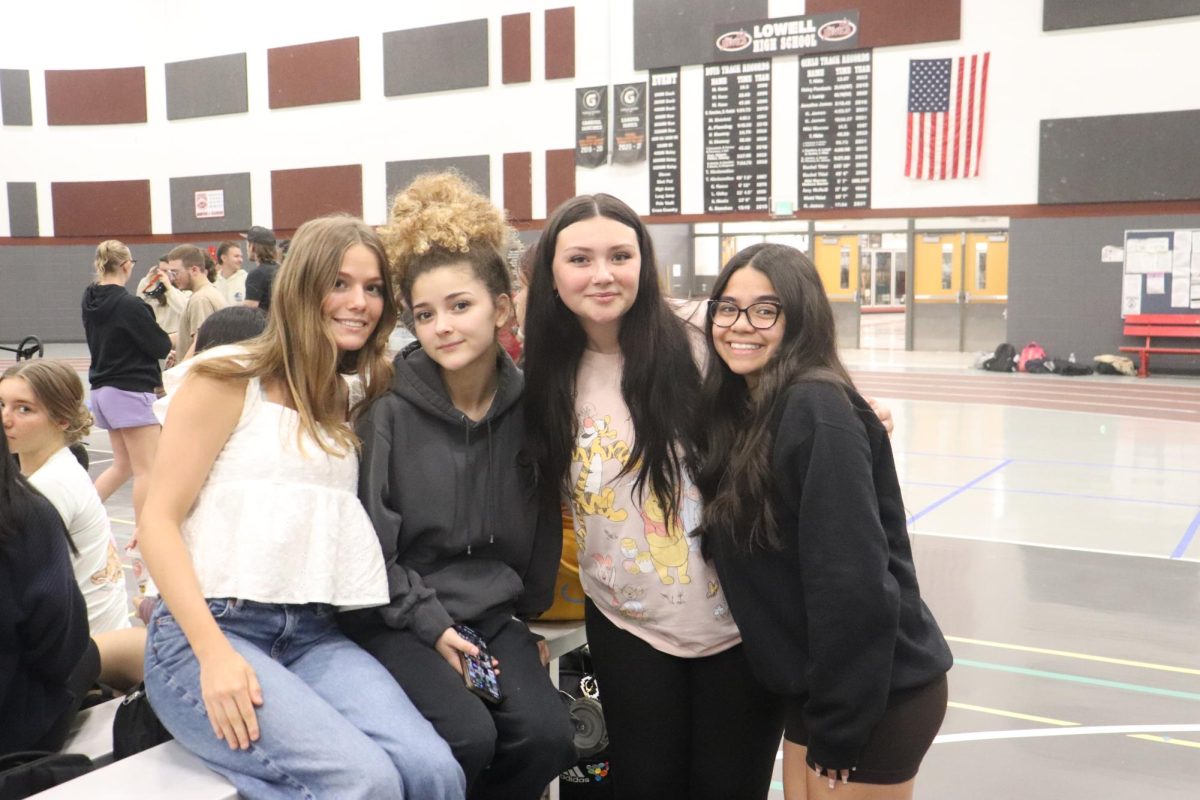 Seniors Alexia Utley, Jaqueline Mallory, Bella Perez, and T'aviana Soria pose together during Criminal Justice's alcohol awareness initiative.                                         