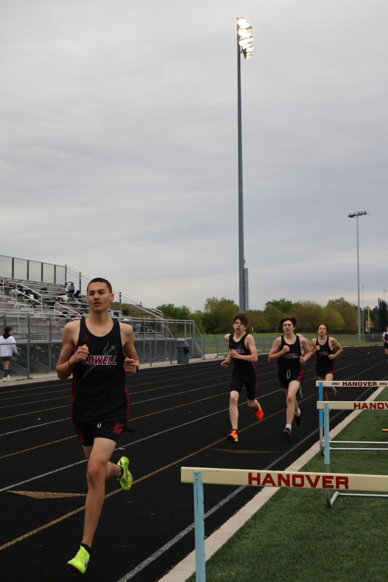 Sophomore Wesley Scheive, freshmen Jacob Noojin, Colin Tripp, and Cody Wunsh run the last stretch of the 800 meter race. They are the up and coming Red Devils.